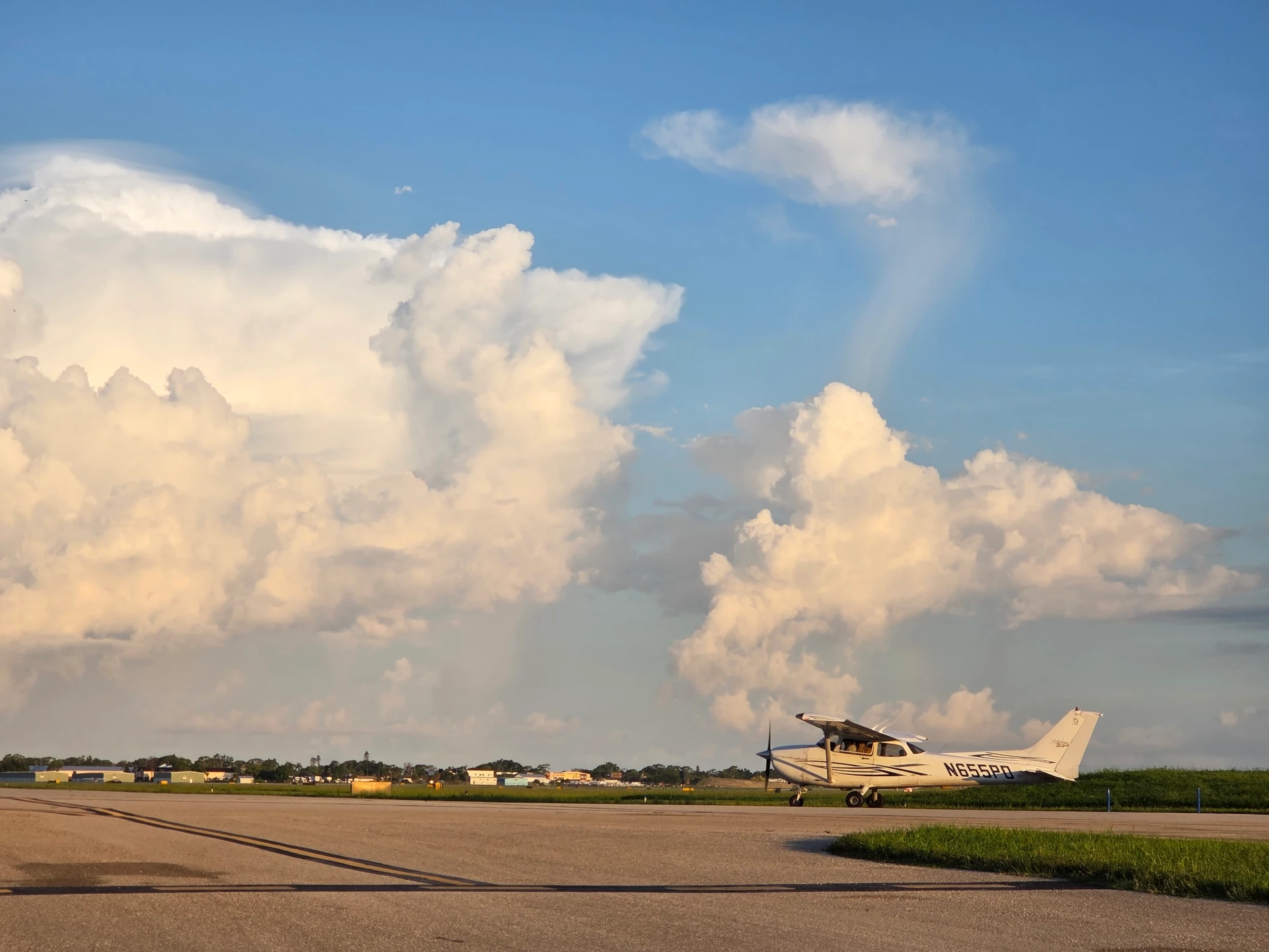 Airplane on runway during golder hour