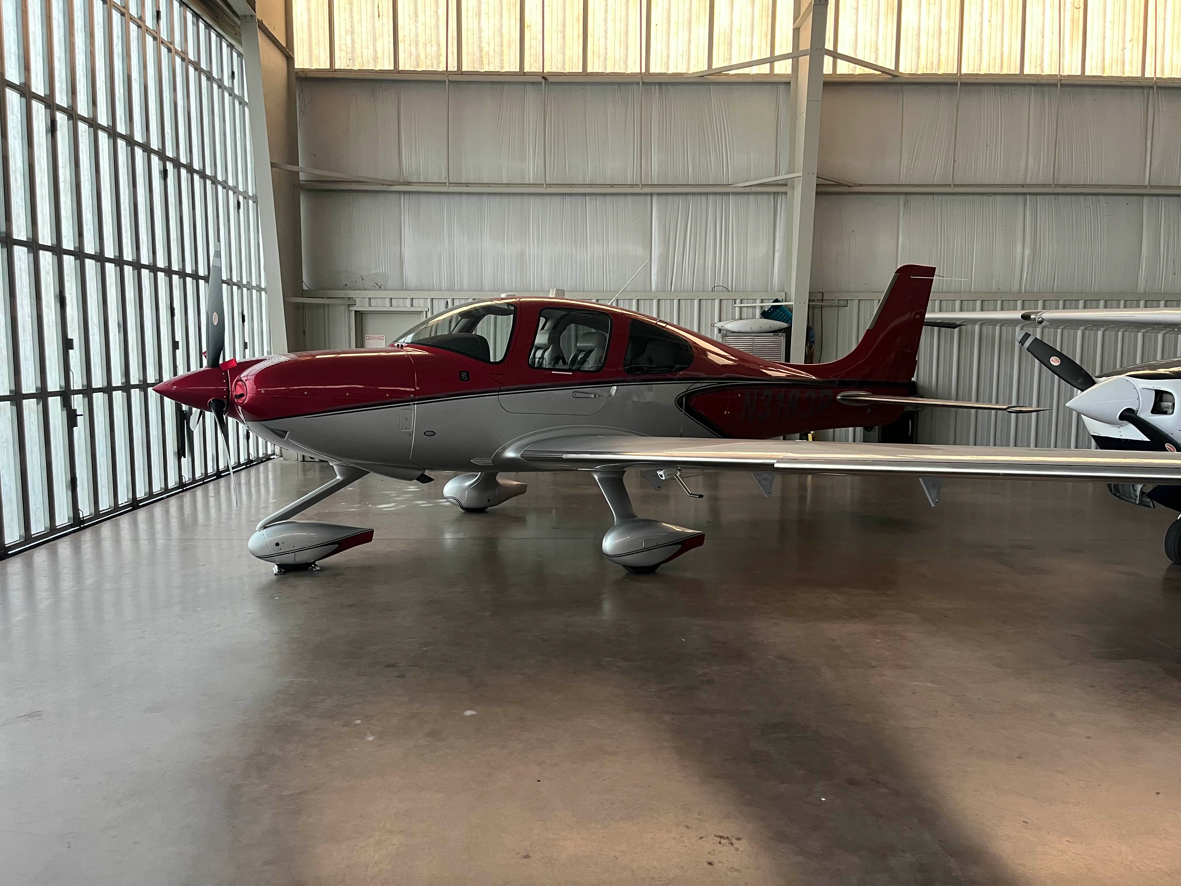 Universal Flight Training Cirrus SR22-G6 N3183P parked on the ramp