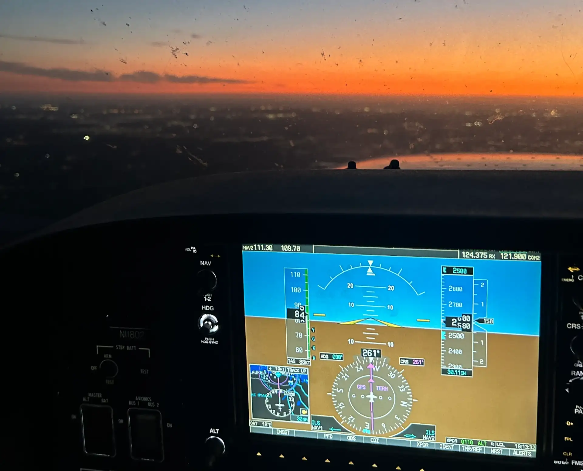 Aircraft instrument panel during a night training flight in Florida