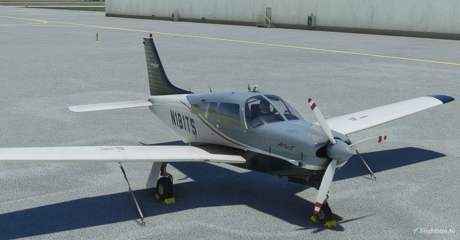 Universal Flight Training Piper Archer II parked at the airport