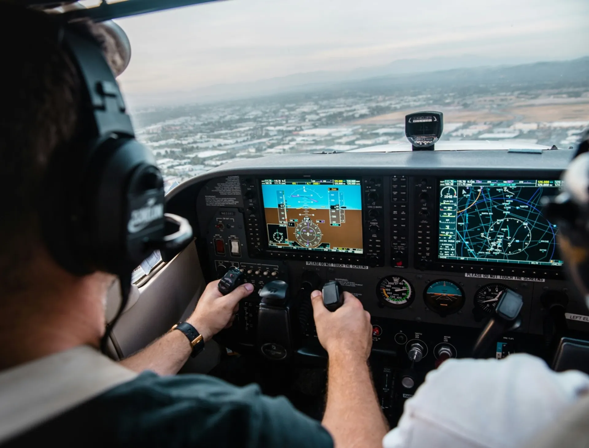 Universal flight training view of pilot over the shoulder